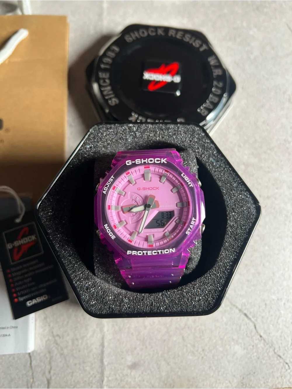 Casio G-Shock Translucent Pink Resin Watch with Black Tin